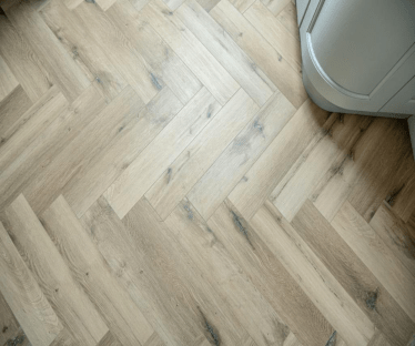 Evolve classic oak herringbone 5mm SPC LVT Click flooring. **Built in underlay**